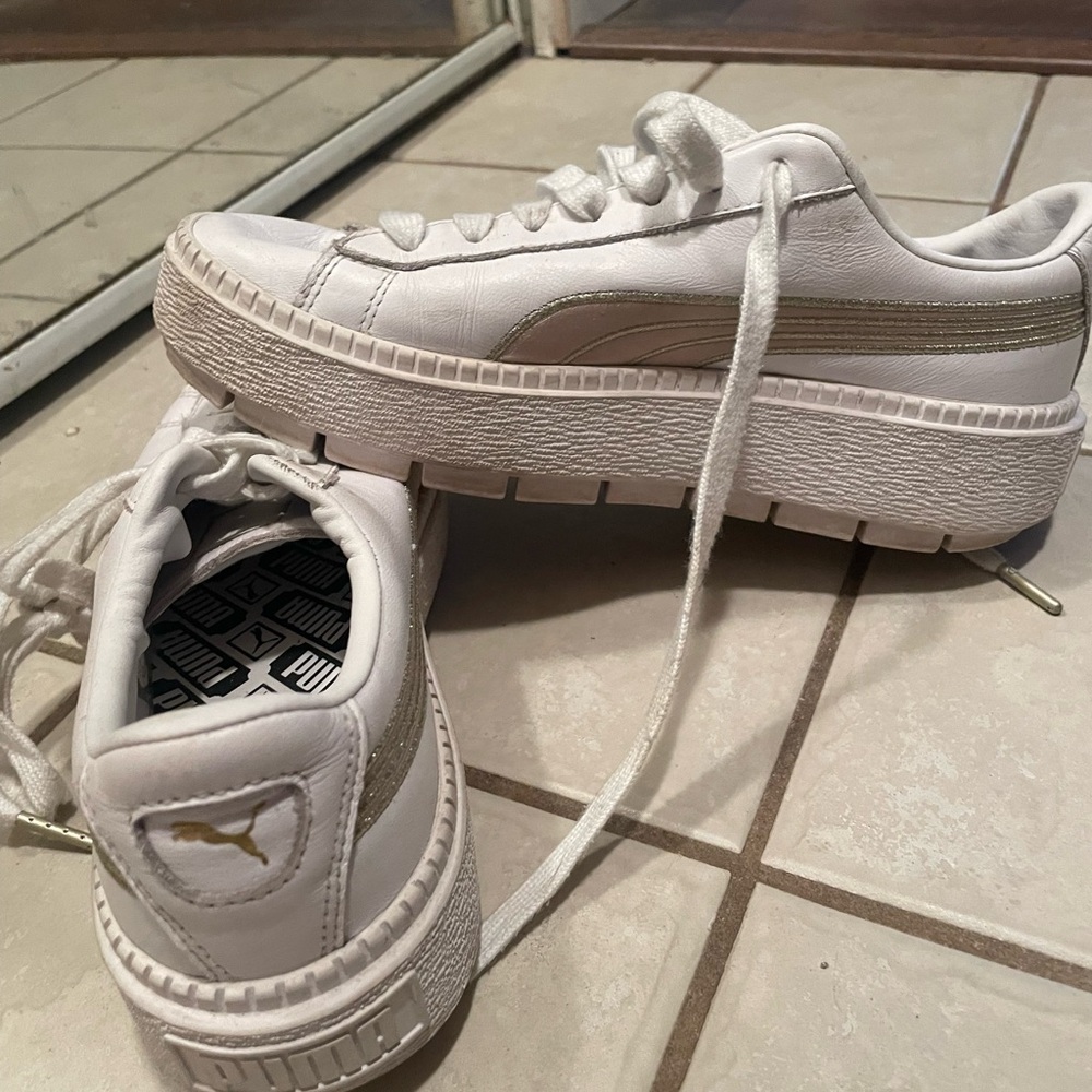 Puma platform sneaker, with gold stripe.
